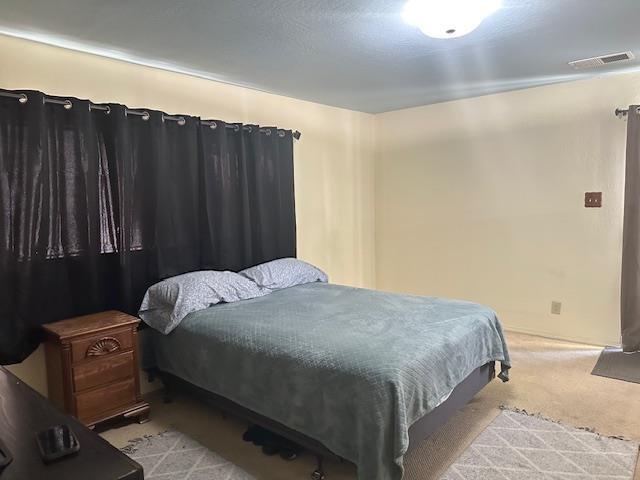 5509 E Crescent Ave, Fresno, CA 93727 - bedroom featuring carpet floors