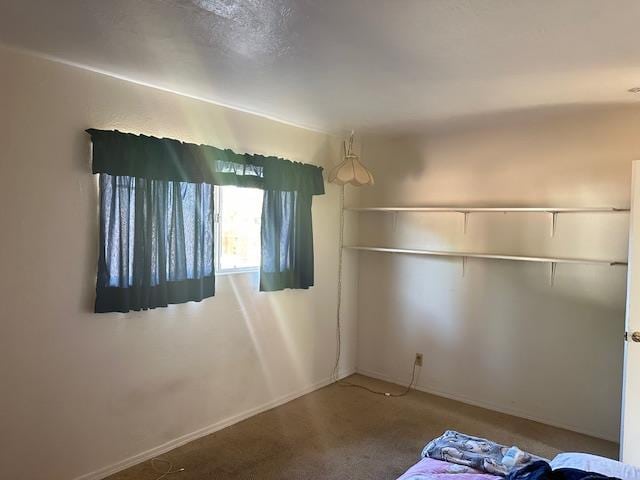 5509 E Crescent Ave, Fresno, CA 93727 - unfurnished bedroom featuring carpet flooring