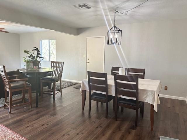 5509 E Crescent Ave, Fresno, CA 93727 - dining space with baseboards and dark wood-style floors