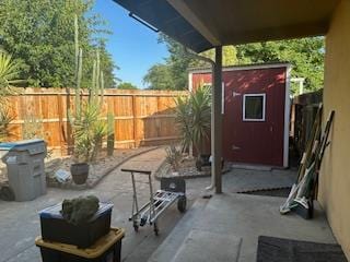 5509 E Crescent Ave, Fresno, CA 93727 - fenced backyard with a patio and a shed
