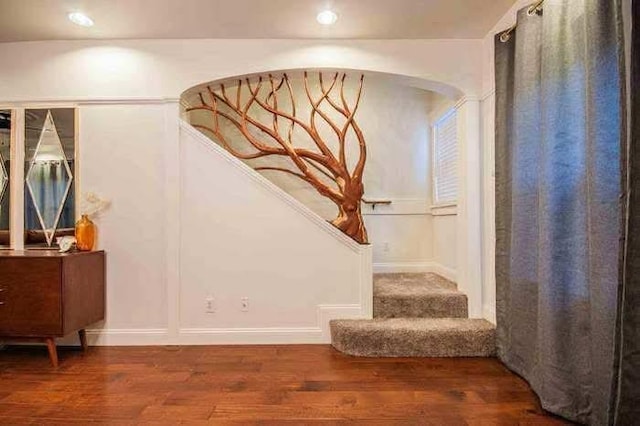 3728 E Huntington Blvd, Fresno, CA 93702 - staircase featuring wood finished floors and arched walkways