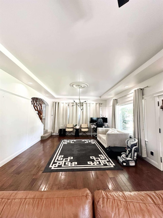 3728 E Huntington Blvd, Fresno, CA 93702 - living area featuring hardwood / wood-style flooring, a chandelier, and stairs