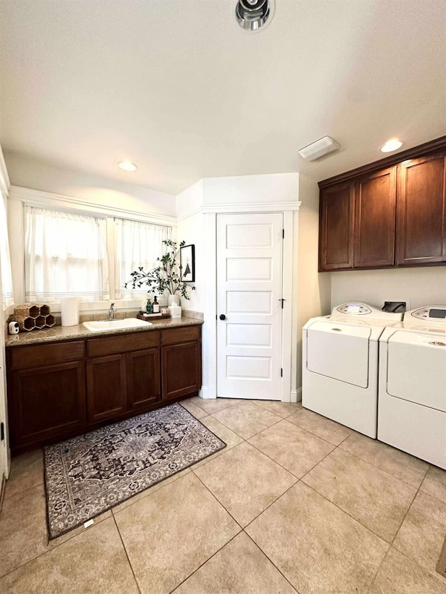 3728 E Huntington Blvd, Fresno, CA 93702 - washroom featuring cabinet space, separate washer and dryer, light tile patterned floors, and recessed lighting