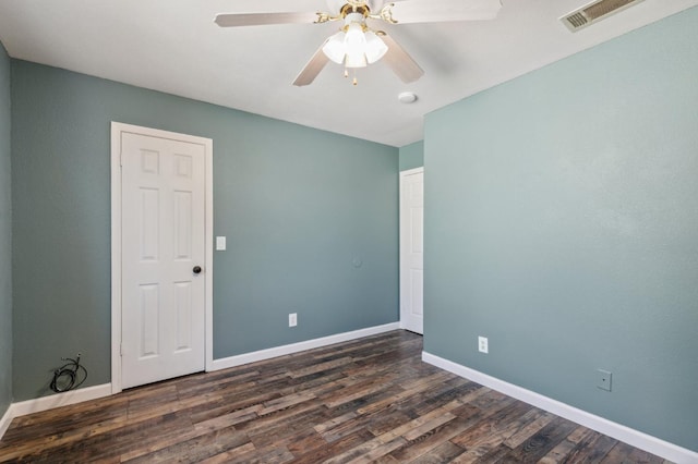 2111 Birch Ave, Clovis, CA 93611 - empty room with dark wood-type flooring and a ceiling fan