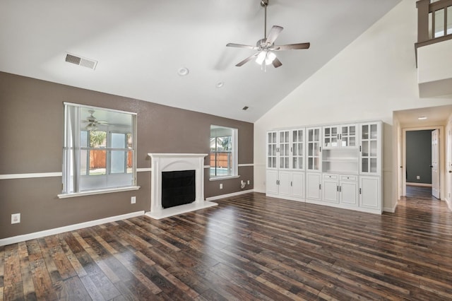2111 Birch Ave, Clovis, CA 93611 - unfurnished living room featuring high vaulted ceiling, a ceiling fan, healthy amount of natural light, and dark wood-style floors