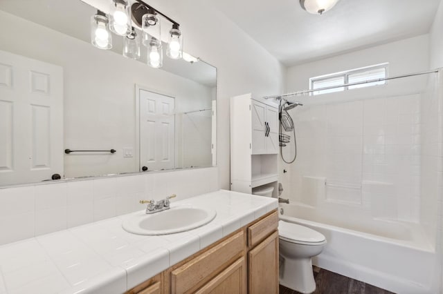 2111 Birch Ave, Clovis, CA 93611 - full bath with vanity, shower / washtub combination, and wood finished floors