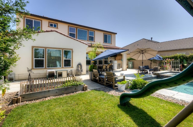 3211 Salem Ave, Clovis, CA 93619 - rear view of house with stucco siding, a lawn, and a patio area