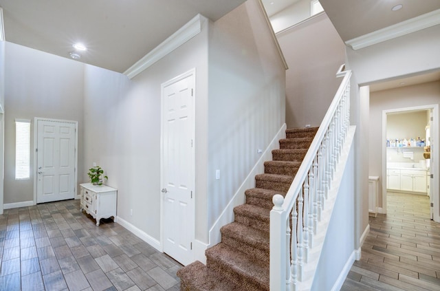 3211 Salem Ave, Clovis, CA 93619 - foyer entrance with crown molding, stairway, wood finished floors, and recessed lighting