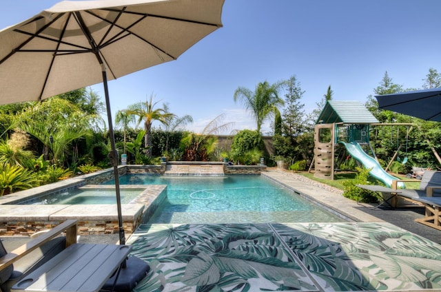 3211 Salem Ave, Clovis, CA 93619 - view of pool with a playground and a pool with connected hot tub