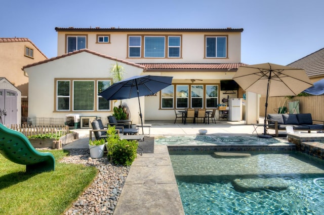3211 Salem Ave, Clovis, CA 93619 - back of house featuring stucco siding, a patio, and an outdoor hangout area