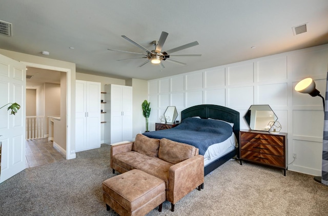 3211 Salem Ave, Clovis, CA 93619 - bedroom with light colored carpet, a decorative wall, and a ceiling fan