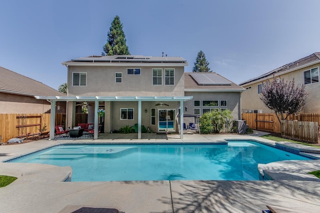 1966 Decatur Ave, Clovis, CA 93611 - view of pool with ceiling fan, a patio area, and a fenced backyard