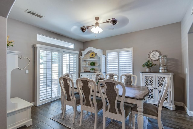 1966 Decatur Ave, Clovis, CA 93611 - dining room with dark wood finished floors, arched walkways, and a ceiling fan