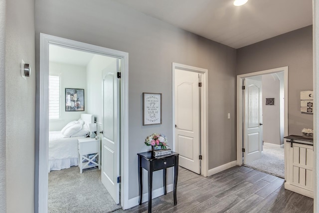 1966 Decatur Ave, Clovis, CA 93611 - corridor featuring wood finished floors and baseboards