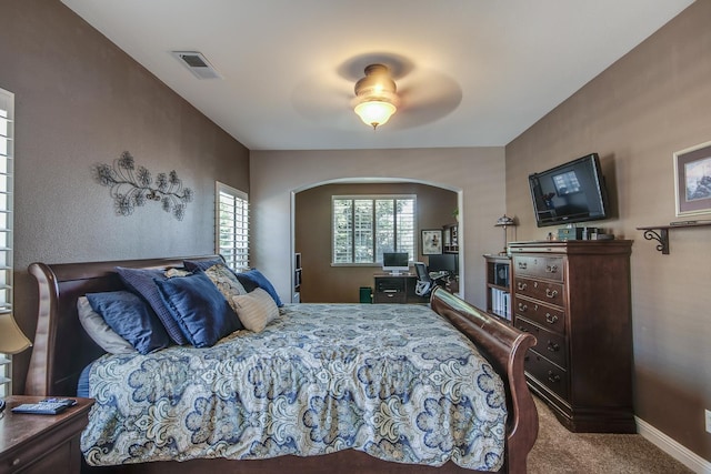 1966 Decatur Ave, Clovis, CA 93611 - carpeted bedroom with arched walkways and ceiling fan