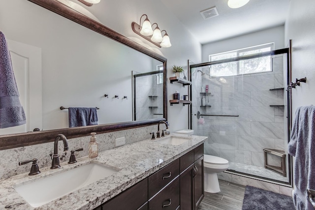 1966 Decatur Ave, Clovis, CA 93611 - bathroom with a shower stall, double vanity, and wood finished floors