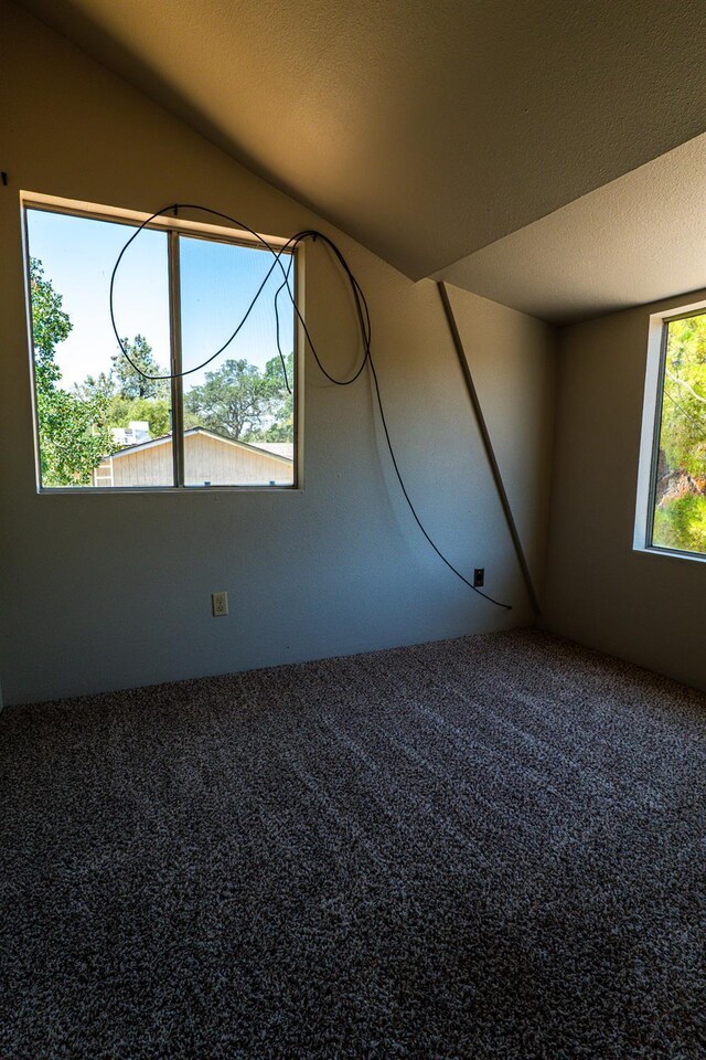 42560 Ranger Circle Way, Coarsegold, CA 93614 - unfurnished room with carpet flooring and lofted ceiling
