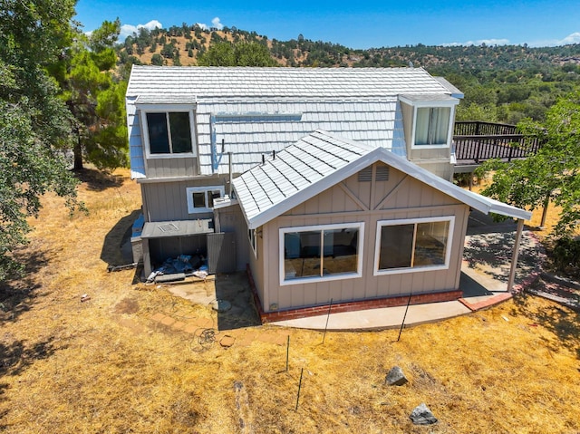 42560 Ranger Circle Way, Coarsegold, CA 93614 - back of property with board and batten siding and a balcony