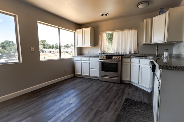 42560 Ranger Circle Way, Coarsegold, CA 93614 - kitchen with stainless steel electric stove, white cabinetry, dark wood finished floors, and dark stone counters