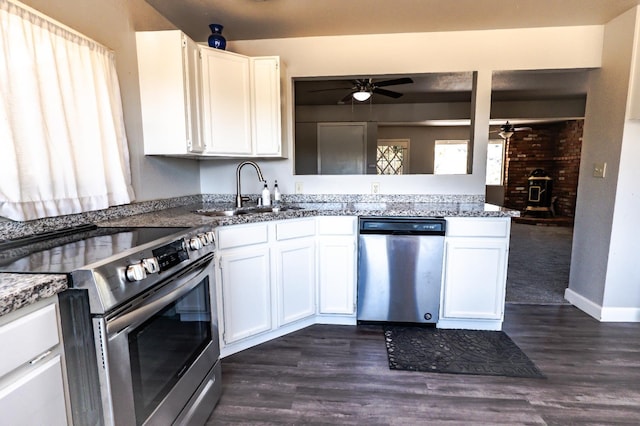 42560 Ranger Circle Way, Coarsegold, CA 93614 - kitchen featuring stainless steel appliances, a ceiling fan, dark wood-style flooring, and white cabinetry