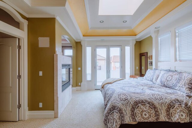 325 Juanita Ave, Oceano, CA 93445 - bedroom featuring ornamental molding, access to exterior, light colored carpet, a raised ceiling, and french doors