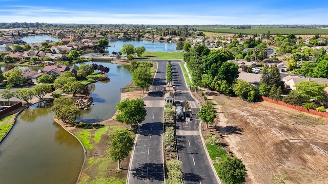 10615 E Landmark Way, Clovis, CA 93619 - aerial view of residential area featuring a nearby body of water