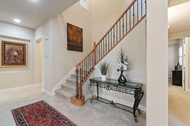 10615 E Landmark Way, Clovis, CA 93619 - staircase with baseboards and tile patterned floors