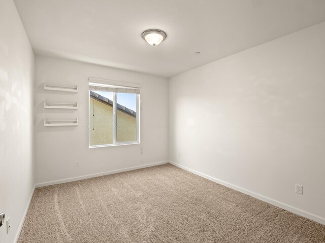 3433 Descanso Ave, Clovis, CA 93619 - empty room with carpet flooring and baseboards