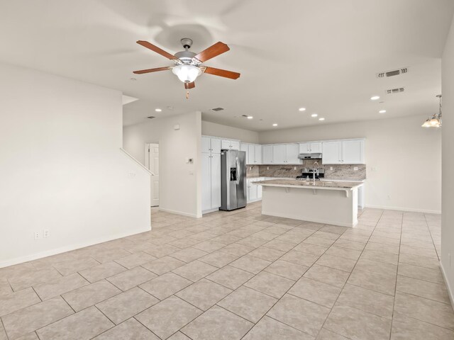 3433 Descanso Ave, Clovis, CA 93619 - kitchen featuring stainless steel refrigerator with ice dispenser, light countertops, backsplash, a ceiling fan, and recessed lighting