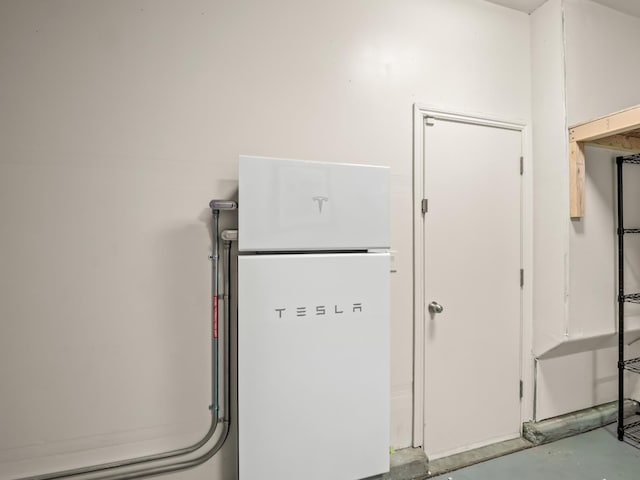 3433 Descanso Ave, Clovis, CA 93619 - detailed view of wall-mounted power storage and concrete flooring