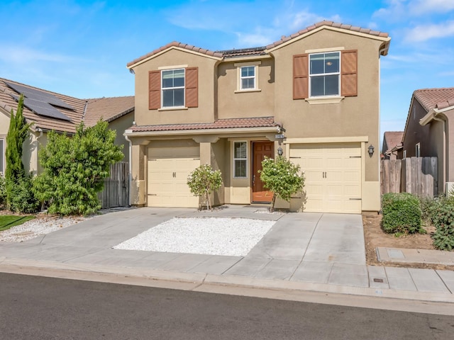 3433 Descanso Ave, Clovis, CA 93619 - view of front facade featuring a tile roof, driveway, stucco siding, and a garage