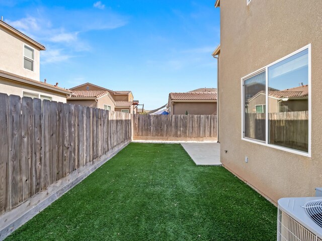 3433 Descanso Ave, Clovis, CA 93619 - fenced backyard featuring a patio