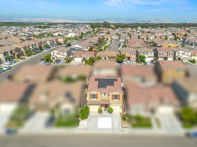 3433 Descanso Ave, Clovis, CA 93619 - aerial view of property's location with nearby suburban area and a mountain backdrop