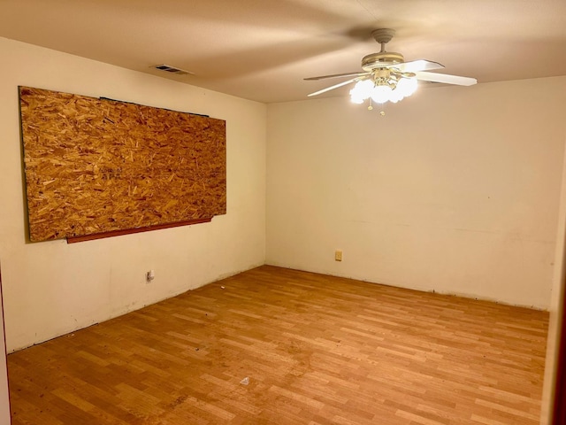 13308 Hood Ave, Hanford, CA 93230 - unfurnished room featuring light wood-style flooring and a ceiling fan