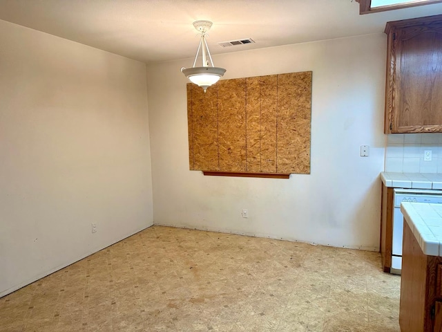 13308 Hood Ave, Hanford, CA 93230 - unfurnished dining area featuring light flooring
