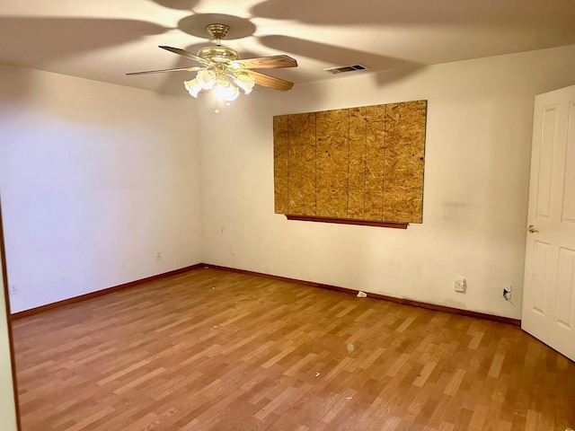 13308 Hood Ave, Hanford, CA 93230 - unfurnished room with wood finished floors and a ceiling fan
