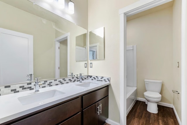 434 Blythewood Pl, Santa Rosa, CA 95407 - full bathroom with double vanity, wood finished floors, decorative backsplash, and bathtub / shower combination