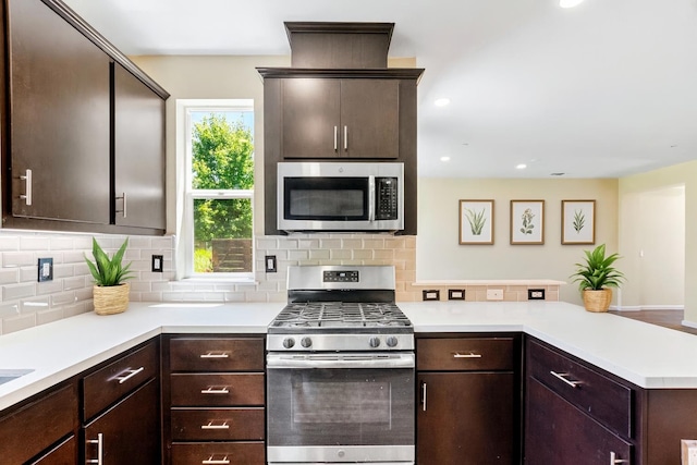 434 Blythewood Pl, Santa Rosa, CA 95407 - kitchen featuring appliances with stainless steel finishes, a peninsula, light countertops, dark brown cabinetry, and recessed lighting