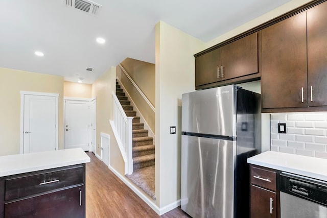 434 Blythewood Pl, Santa Rosa, CA 95407 - kitchen with stainless steel appliances, light countertops, dark brown cabinets, backsplash, and recessed lighting