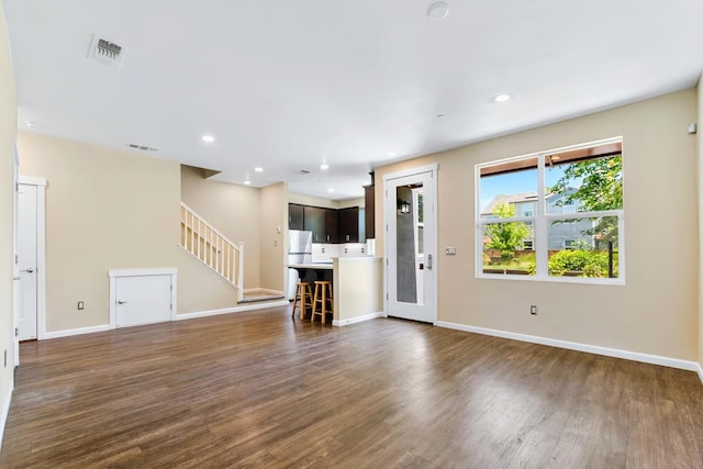 434 Blythewood Pl, Santa Rosa, CA 95407 - unfurnished living room with dark wood-style floors, stairway, and recessed lighting