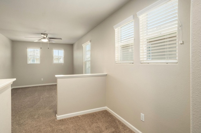 3482 Elevations Way, Clovis, CA 93619 - carpeted empty room featuring plenty of natural light and a ceiling fan