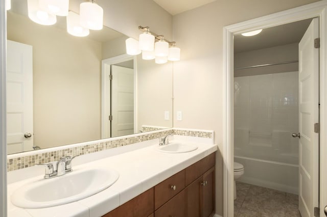 3482 Elevations Way, Clovis, CA 93619 - bathroom featuring double vanity, tile patterned flooring, and washtub / shower combination