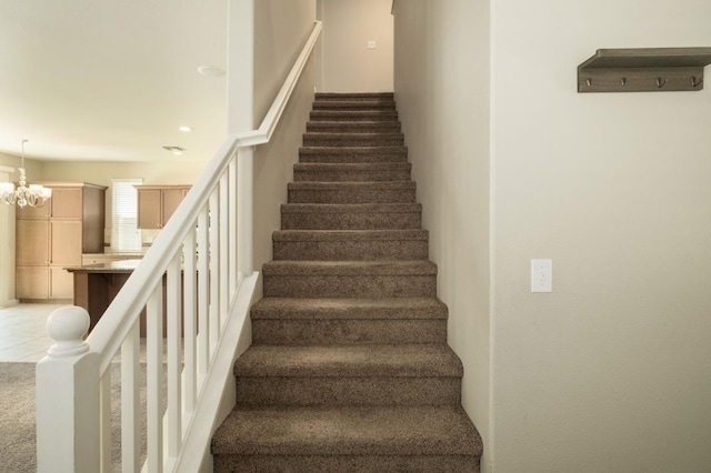3482 Elevations Way, Clovis, CA 93619 - stairway with carpet, recessed lighting, and a chandelier