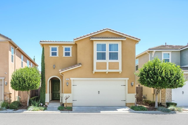 3482 Elevations Way, Clovis, CA 93619 - view of front of home featuring stucco siding, a garage, a tiled roof, and concrete driveway