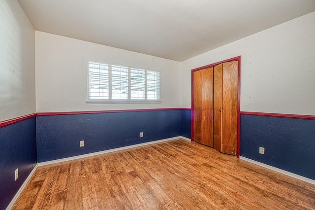 5578 E Perrin Rd, Clovis, CA 93619 - spare room with wood finished floors and baseboards