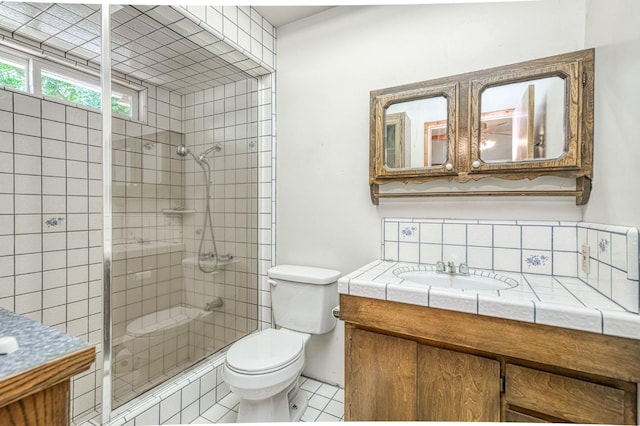 5578 E Perrin Rd, Clovis, CA 93619 - bathroom featuring vanity, a stall shower, tile patterned flooring, and tasteful backsplash