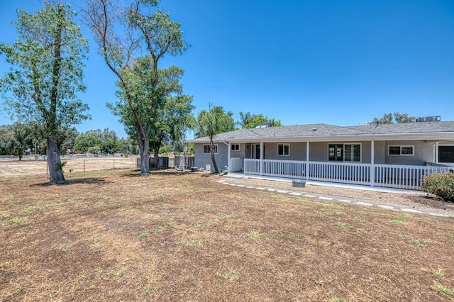 5578 E Perrin Rd, Clovis, CA 93619 - back of property with stucco siding and covered porch
