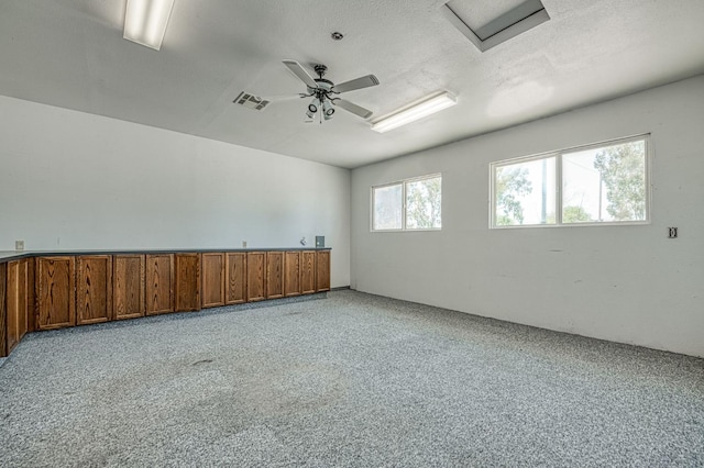 5578 E Perrin Rd, Clovis, CA 93619 - unfurnished room with attic access and a ceiling fan