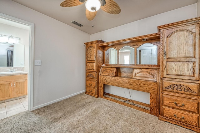 5578 E Perrin Rd, Clovis, CA 93619 - unfurnished bedroom with light carpet, ensuite bath, and a ceiling fan