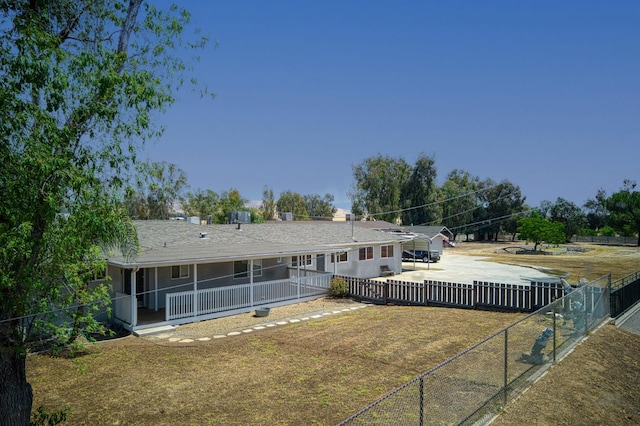 5578 E Perrin Rd, Clovis, CA 93619 - rear view of house featuring driveway